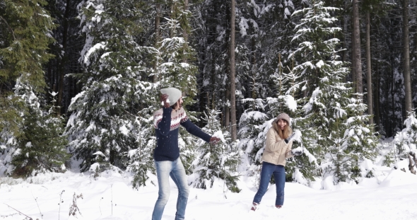 Couple Winter Forest Walking Man And Woman Throwing Snow Having Fun In Snowy Park alt