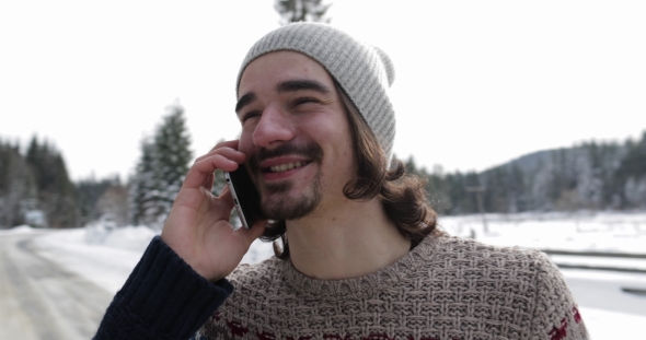 Man Winter Snow Forest Walk Young Guy Call Smart Phone Happy Smile alt