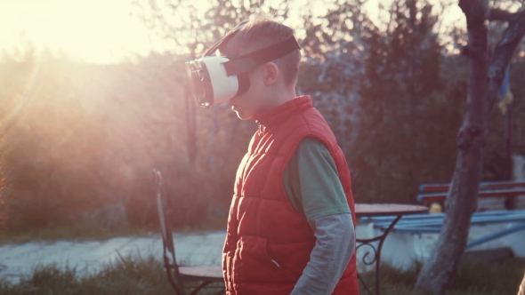 Little Boy Watching Video Cartoon 360 in VR alt