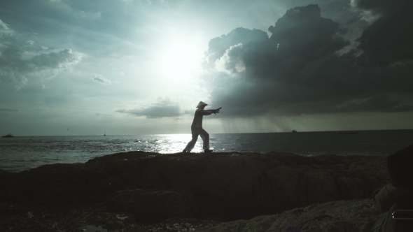 Man Practicing Breathing Exercises On Nature alt