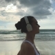 Woman Run On The Beach And Listen Music - VideoHive Item for Sale