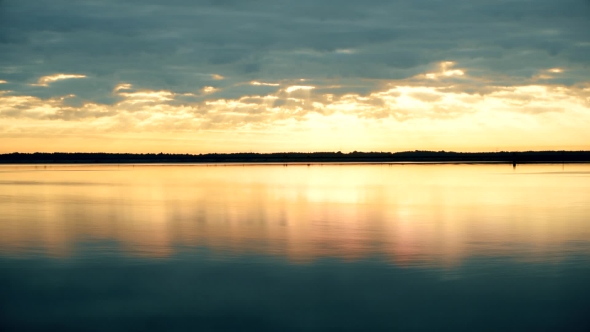 Splendid Clouds at Dawn Over Water