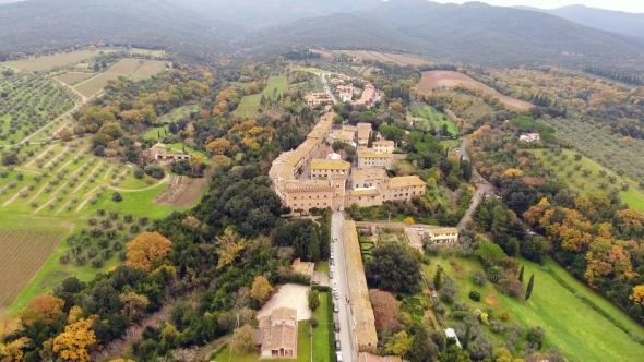 Small Ancient Town Situated in the Middle of Rural Landscape with Cultivated Field