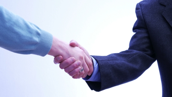 Business Partners Handshake - Men and Women