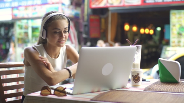 Happy Woman During Video Chat On Laptop