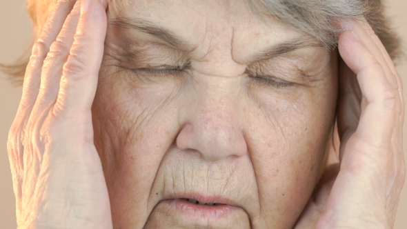 Elderly Woman Aged 80s Suffers From Headaches