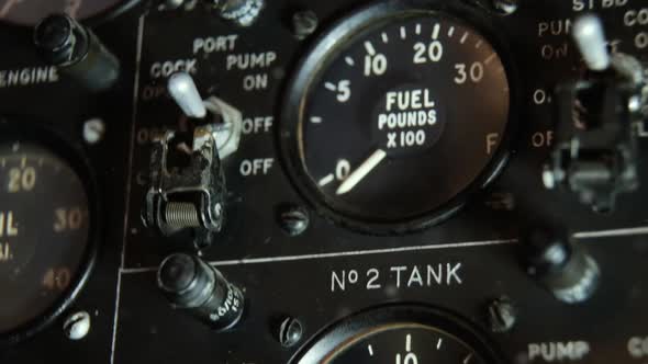 Aircraft Fuel Gauge Indicator in a Vintage War Plane. alt