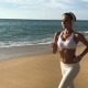 Girl Jogging On The Beach - VideoHive Item for Sale