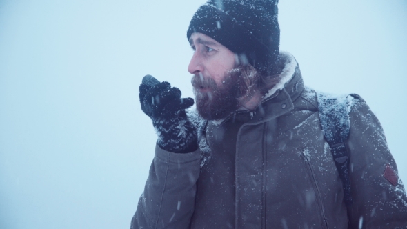 Man with Portable Radio Ser Searching Signal alt
