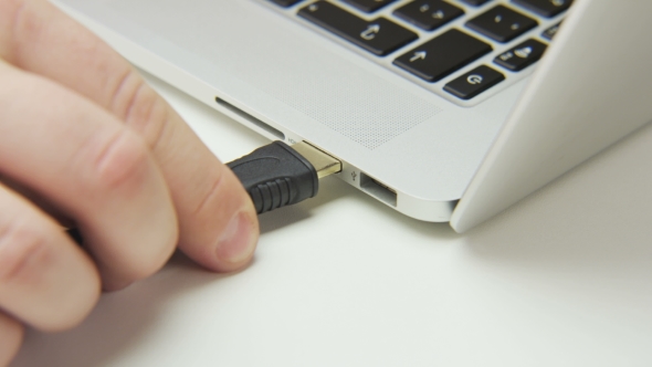 Plugging Black Cable To a Computer alt