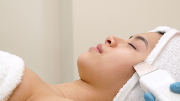 Physical Therapist Peels Girl's Cheek alt