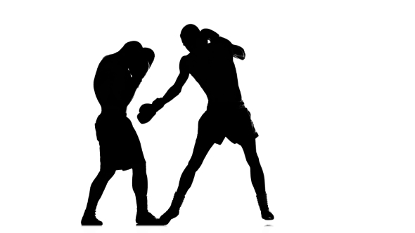 Two Young Fighters Train Left Hook. Black Silhouette alt