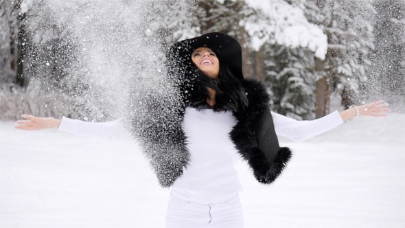 Charming Girl Enjoys The Snow alt