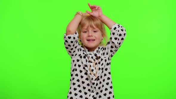 Lovely Funny Teen Kid Child Girl Smiling Friendly and Doing Bunny Ears Gesture on Head Having Fun alt
