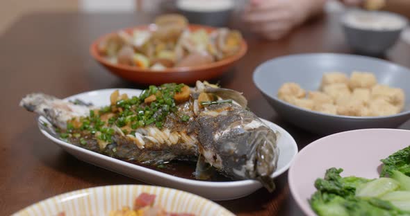 Chinese style family dinner meal at home alt