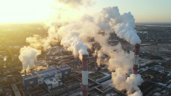 Industrial factory air pollution, smokestack exhaust gases. Industry zone alt