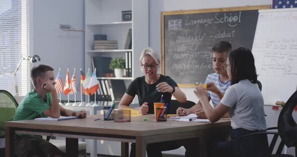 Teacher Giving English Class with Sticky Notes alt