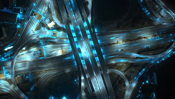 4K : Aerial Hyper lapse drone view of road junction with moving cars. alt