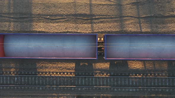 Aerial Shot of Wagons with Industrial Goods on Railway alt