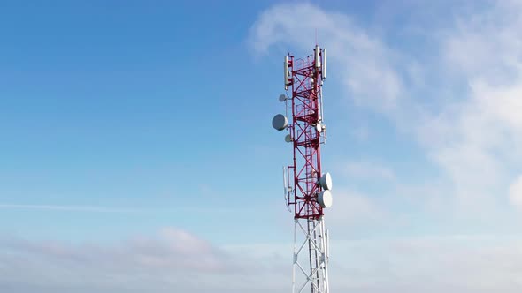 Aerial Radio Communication Base Station on a Blue Sky Background alt