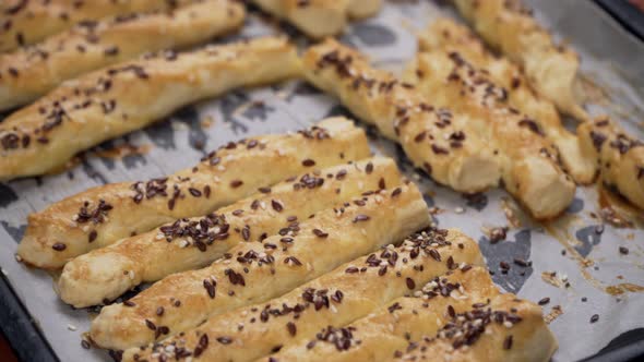 Delicious sweet baked dough sticks alt