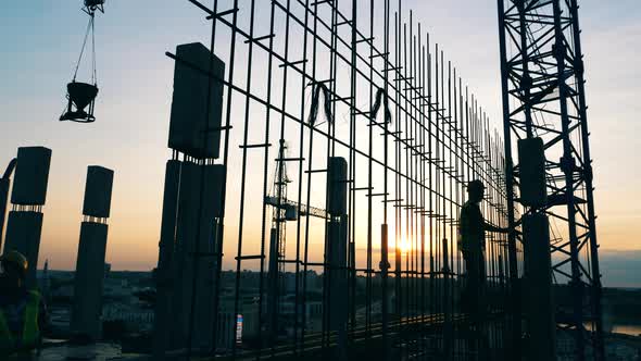 Floor Foundation of a High-rise Building Is Being Made By Workers alt