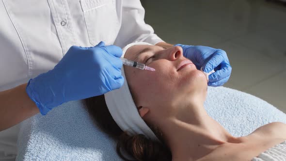 Girl Getting Multiple Injections of Pharmaceutical