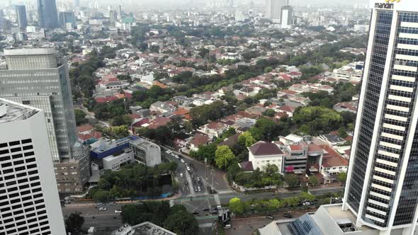 Cinematic citycape aerial view, overhead view of buildings and skyscrapers in a city.