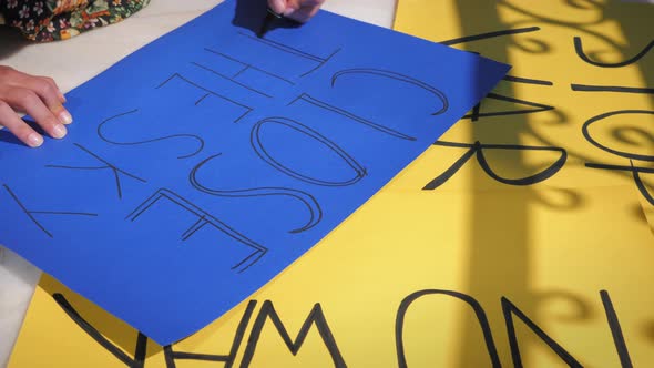 Banner with inscription Close The Sky on blue paper. Crisis in Ukraine alt