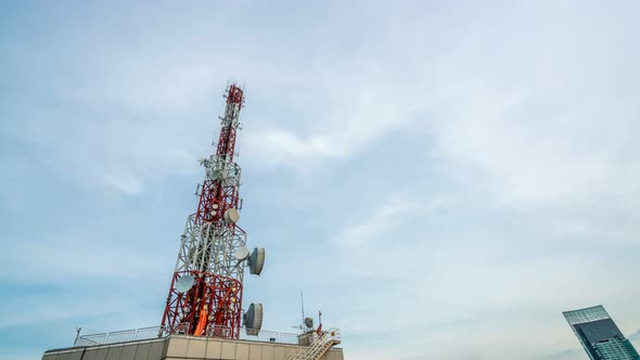 Time Lapse of Telecommunication Tower Against Sky and Clouds in Background alt
