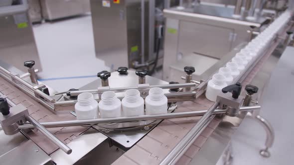 Empty Containers on the Drug Assembly Line