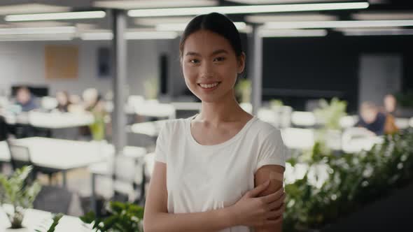 Happy Vaccinated Asian Woman Posing After Covid19 Vaccination In Office alt