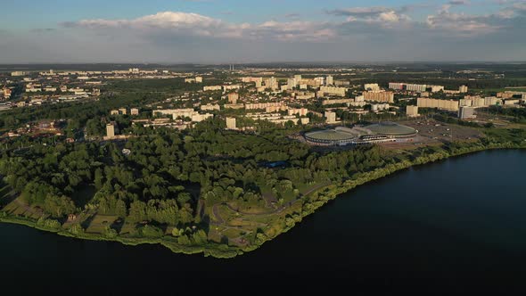 Top View of the City Park and Sports Complex in Chizhovka.Recreation Park with Bike Paths in Minsk alt