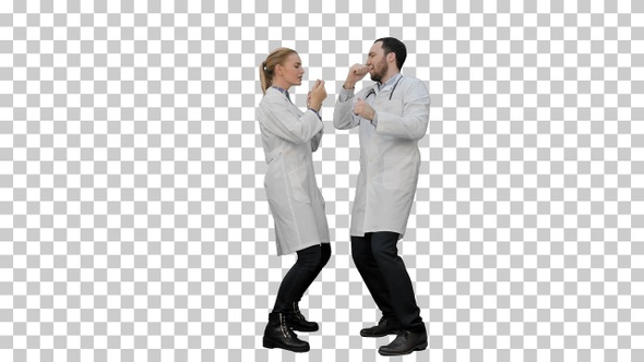 Two funny medical doctors with funny energy dance, Alpha Channel