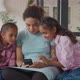 Cheerful Mom and Kids Networking on Cellphone - VideoHive Item for Sale
