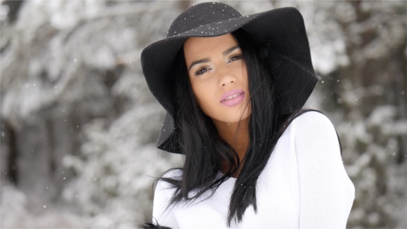 Brunette With a Stylish Hat in Winter