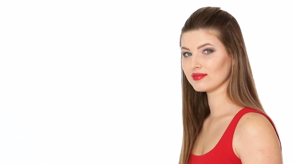 Woman Holding Red Apple and Smiling on White Background