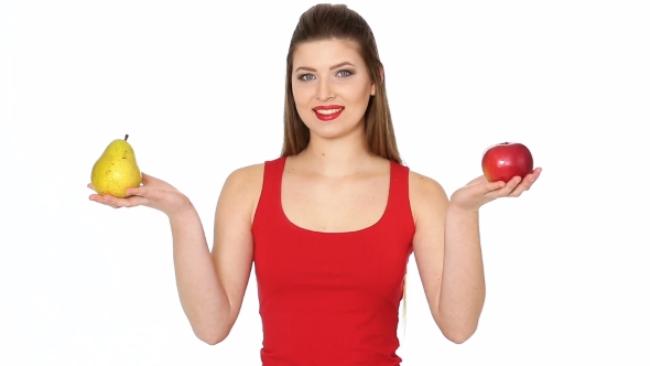 Woman Chooses Between Apple and Pear