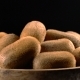 Kiwi in Wooden Bowl on Black Background - VideoHive Item for Sale