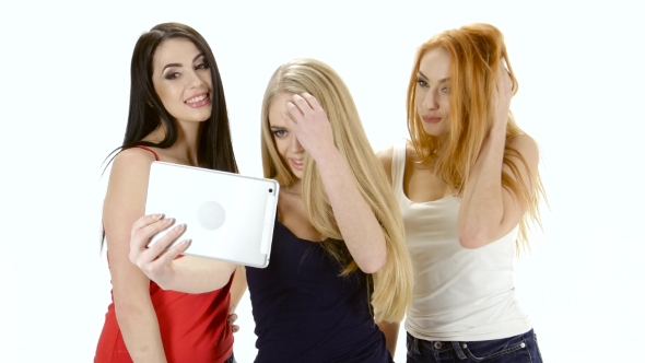 Brunette, Redhead and Blonde Girl Make Selfie Photo on Tablet alt