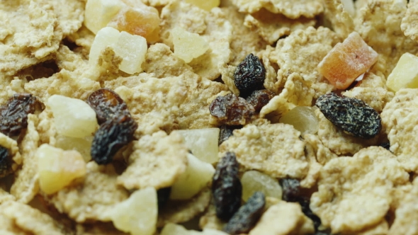 Multigrain Flakes With Pieces of Raisins and Dried Fruits. Natural and Healthy Eating alt