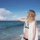 The Beautiful Blonde in a Bikini Walking on the Beach - VideoHive Item for Sale