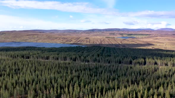 Flying From Slieve League Towards Lough Auva in County Donegal  Ireland alt