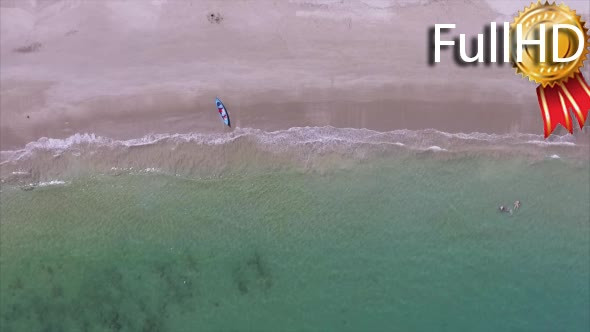 Aerial View of the Clean Sandy Beach With Jet Ski