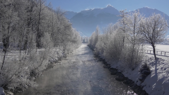 Mountain River and Trees in Hoarfrost