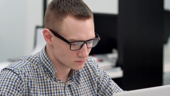 Efficient Businessman Answering Phone Call at the Office, Stock Footage