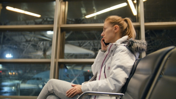 Airline Passenger in an Airport Lounge alt