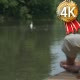 an Adult Man Sits on a Chair Near a Lake - VideoHive Item for Sale