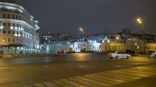 Rapid Movement of Cars on City Streets in Evening Time alt