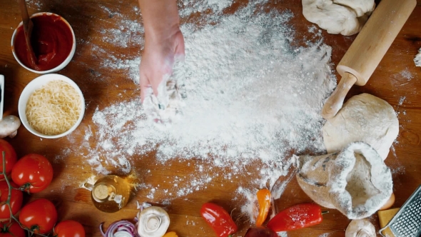 Prepearing Dough for Homemade Pizza